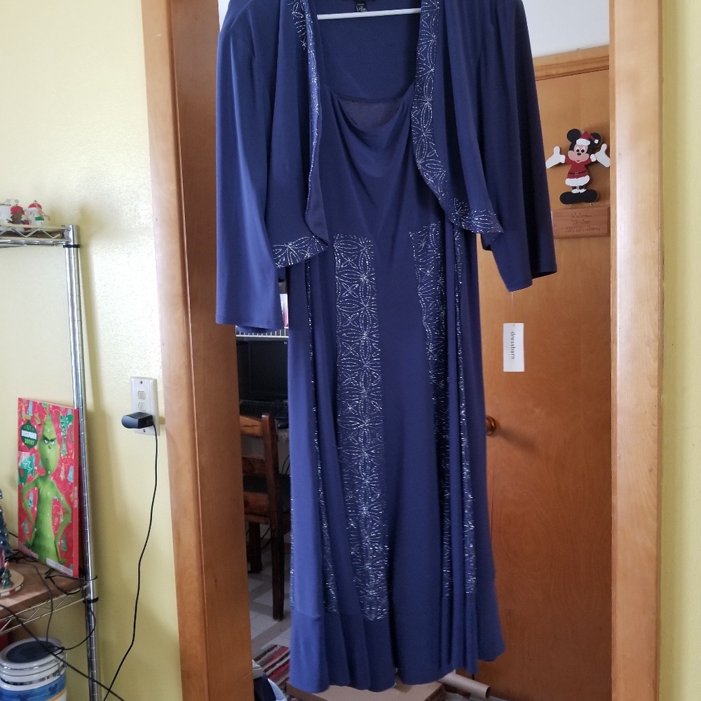 Brand new sleeveless dress with matching jacket